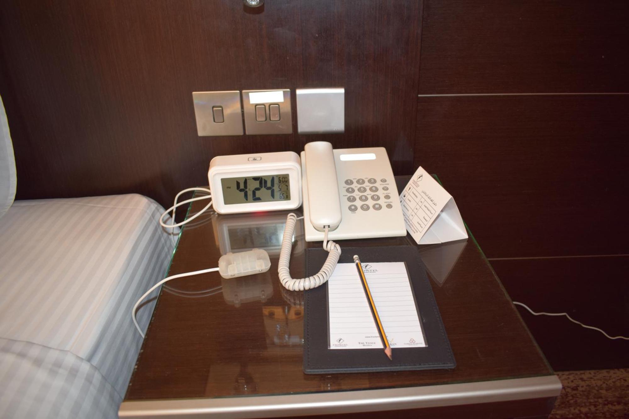 Frontel Al Harithia Hotel Medina Exterior photo A telephone in a hotel room