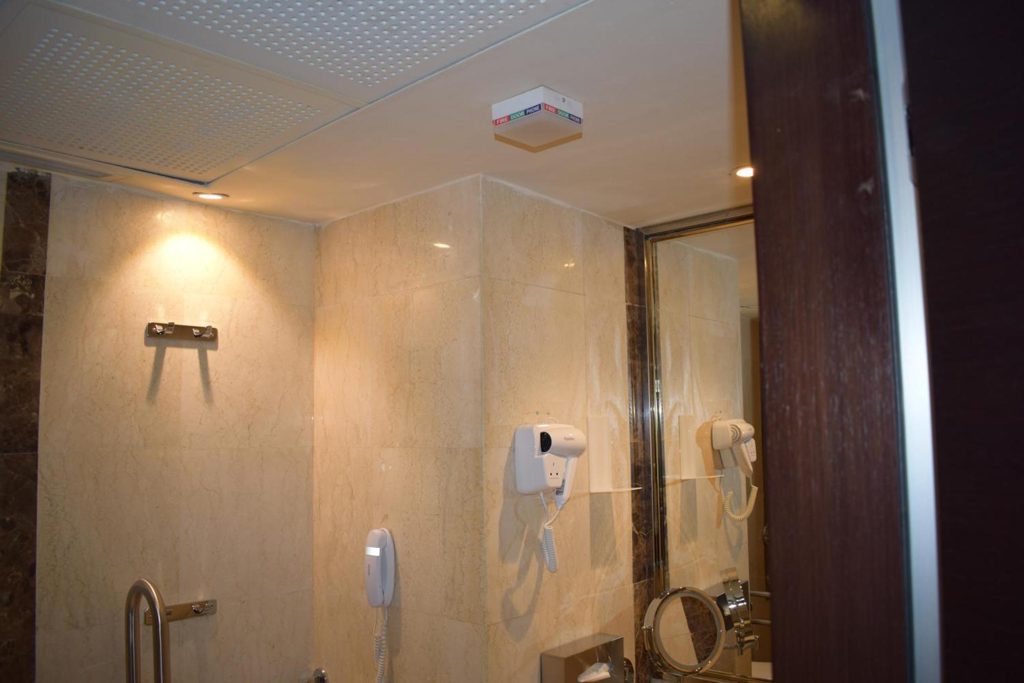 Frontel Al Harithia Hotel Medina Exterior photo Smoke detector in a bathroom