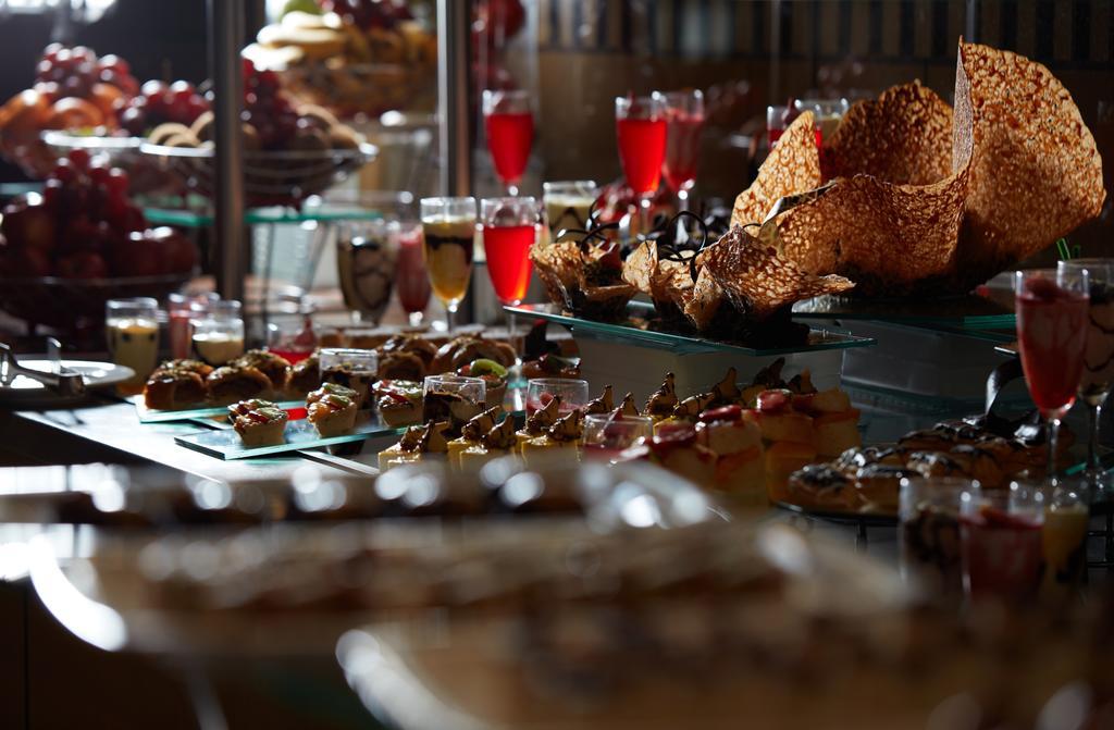 Frontel Al Harithia Hotel Medina Exterior photo A dessert buffet