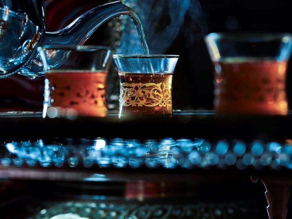Frontel Al Harithia Hotel Medina Exterior photo Turkish coffee being served