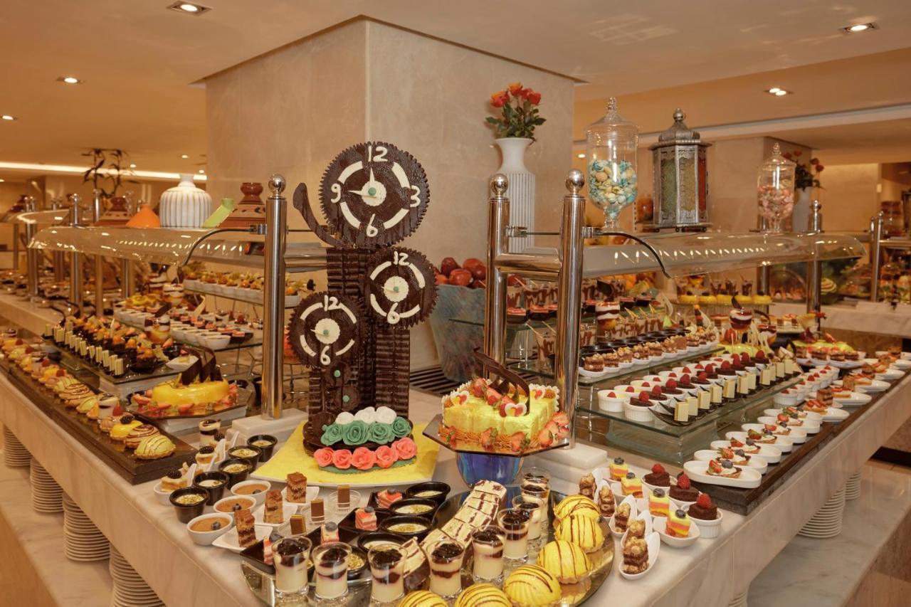 Frontel Al Harithia Hotel Medina Exterior photo A dessert buffet