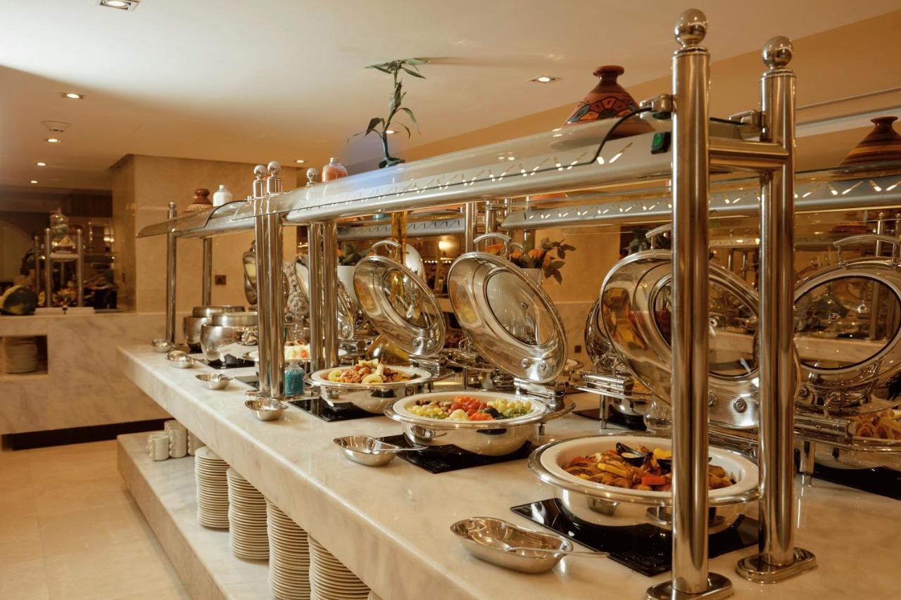 Frontel Al Harithia Hotel Medina Exterior photo A buffet at a hotel